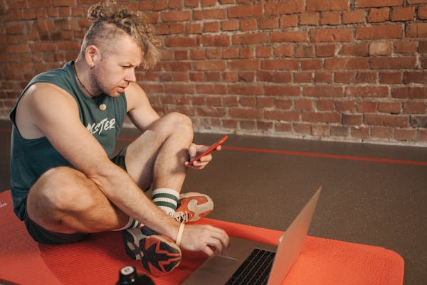 Man scrolling endlessly on his phone